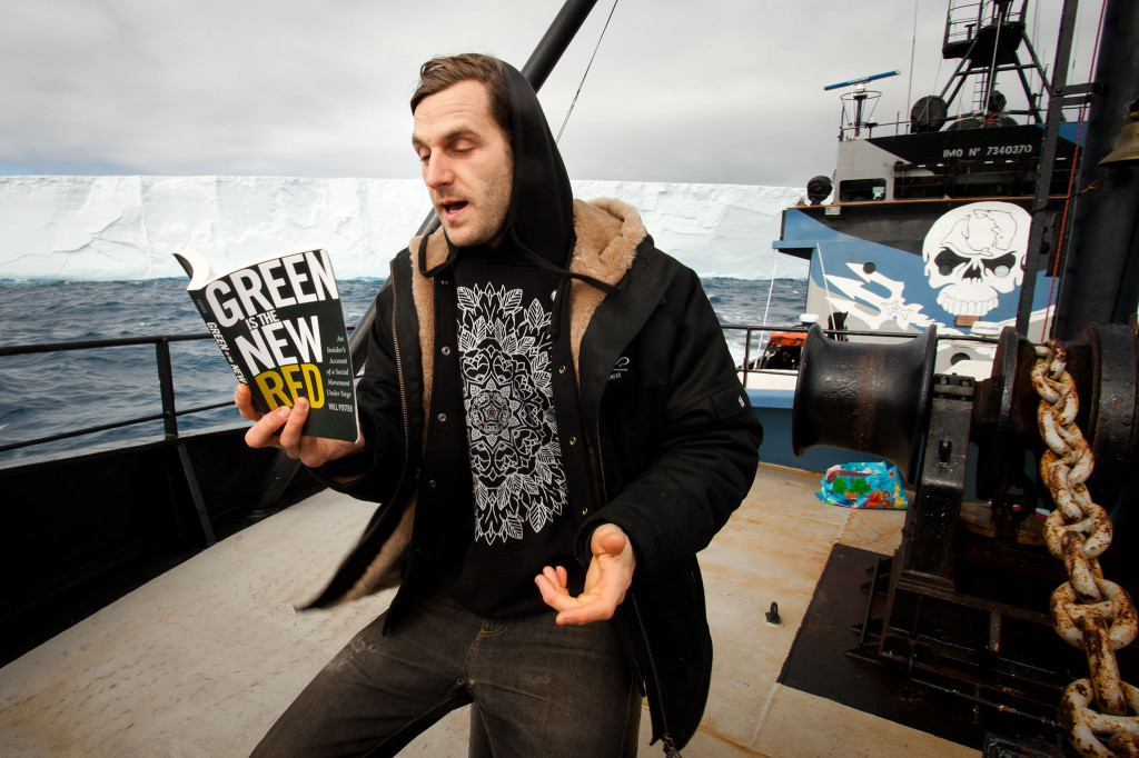 Sea Shepherd crew with books at sea.