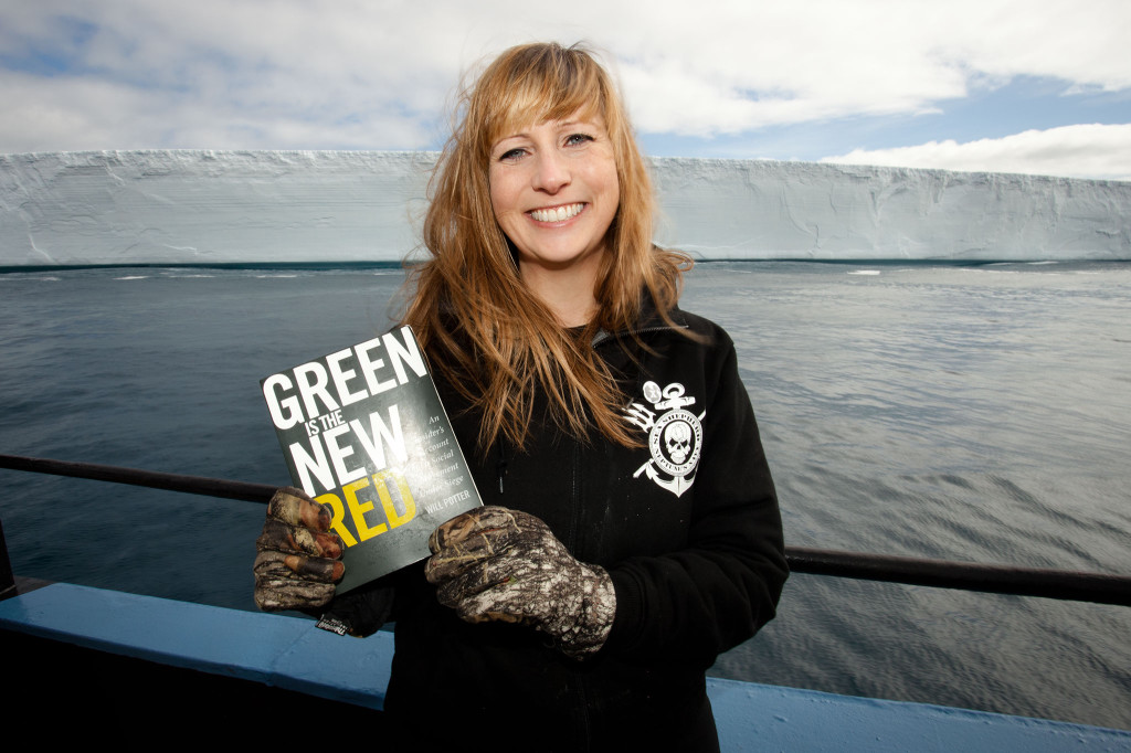 Sea Shepherd crew with books at sea.