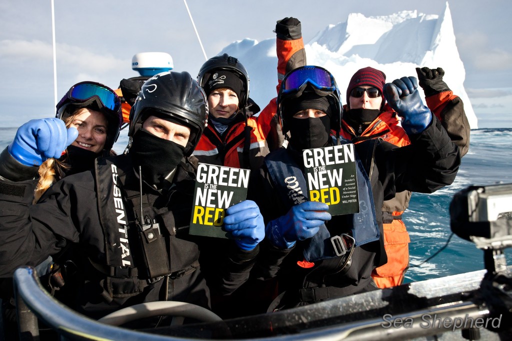 Sea Shepherd crew with books at sea.