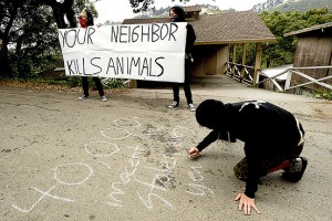 Home protest by animal rights activists in Santa Cruz. Photo by AP/WSJ.